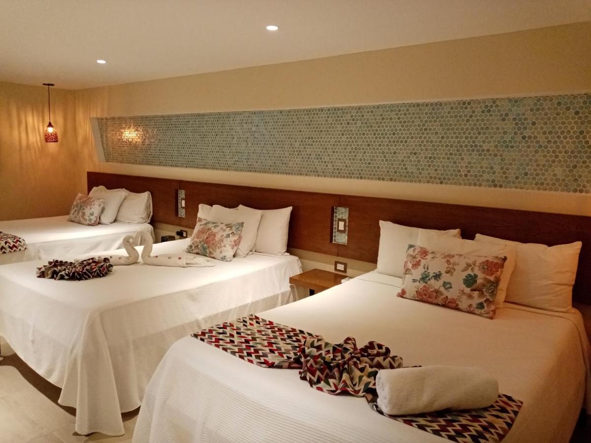קנקון Brisas 10 Beachside Suites מראה חיצוני תמונה